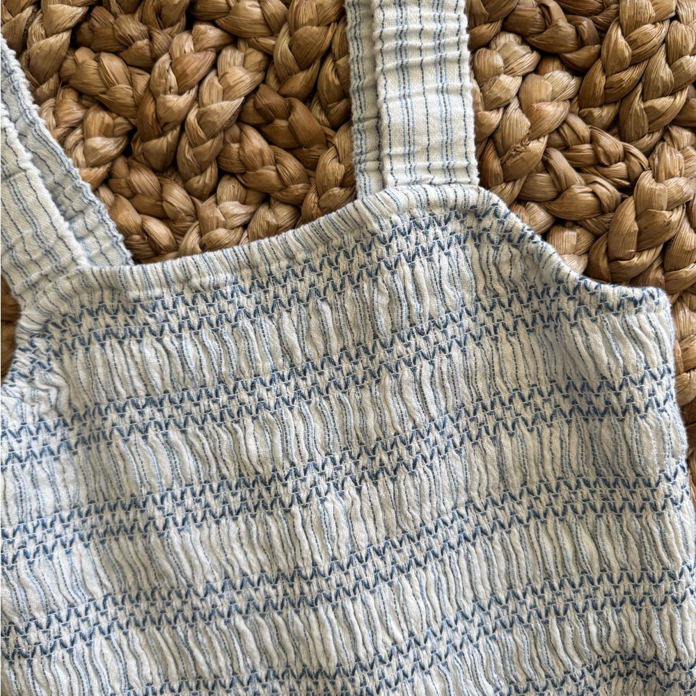 Blue and off-white smocked romper